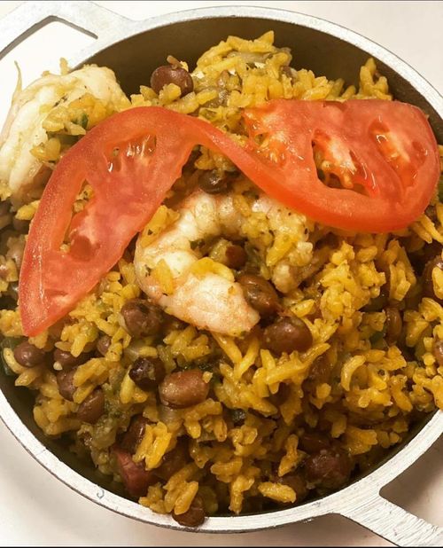 Cafe Central signature dishes Jibarito, Arroz con Gandules (rice with pigeon peas), Pernil (roast pork), various stews and combo plates.